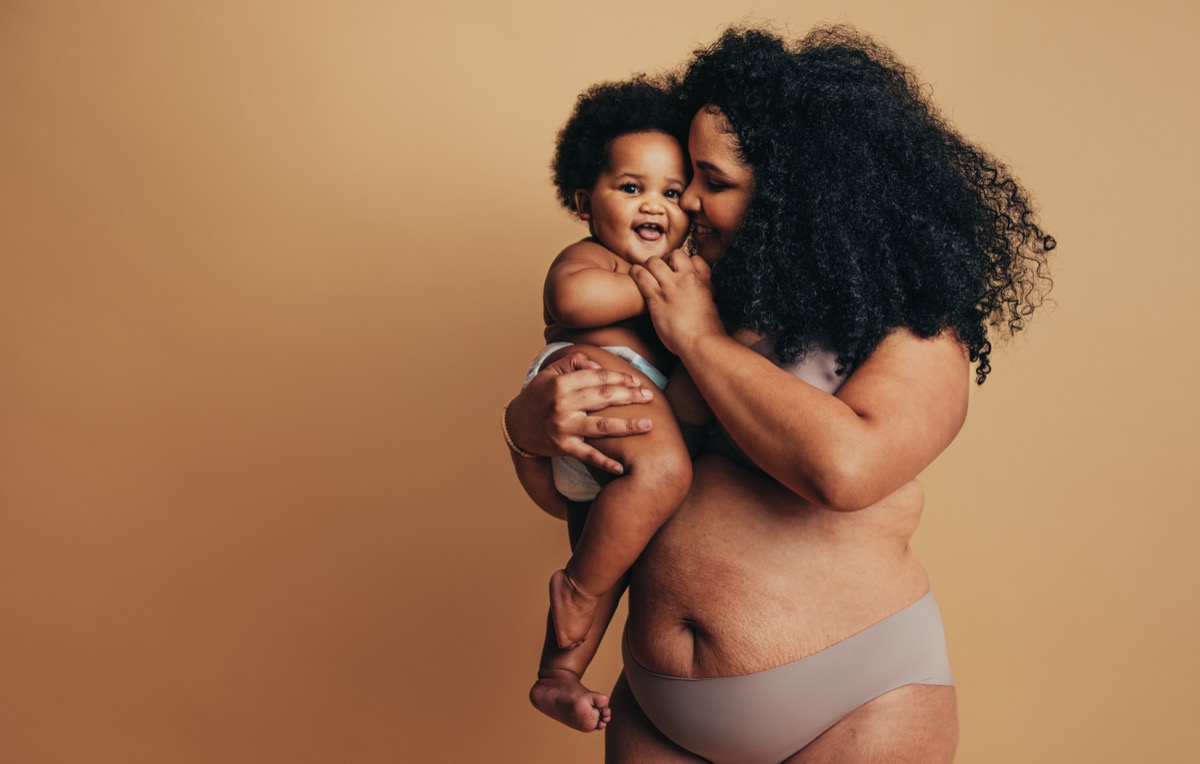 A parent holding their baby